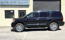 Black 2014 Nissan Pathfinder with dark privacy window tint